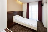 Postel nebo postele na pokoji v ubytování Hotel Rottal