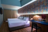 Een bed of bedden in een kamer bij ibis Styles Kuala Lumpur Bukit Bintang