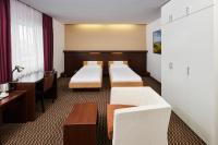 Postel nebo postele na pokoji v ubytování Hotel Rottal