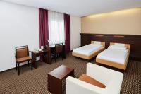 Postel nebo postele na pokoji v ubytování Hotel Rottal