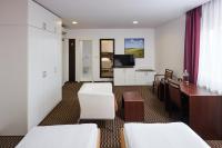 Postel nebo postele na pokoji v ubytování Hotel Rottal