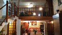 a view of a living room with a couch and lights at Le Mas Nomade in Callian