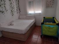 Posteľ alebo postele v izbe v ubytovaní Villa andaluza relax y playa en entorno tranquilo