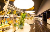 a store with a vase with a plant on a counter at Bosphorus Sorgun Hotel - Ultra All Inclusive in Side