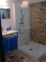 a bathroom with a shower and a sink at Le Mas Nomade in Callian