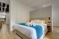 Posteľ alebo postele v izbe v ubytovaní Aqua Apartments Málaga