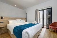 Posteľ alebo postele v izbe v ubytovaní Aqua Apartments Málaga