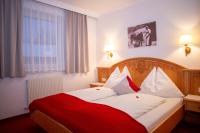 Postel nebo postele na pokoji v ubytování Appartement-Gästehaus Ursula