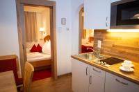 Postel nebo postele na pokoji v ubytování Appartement-Gästehaus Ursula