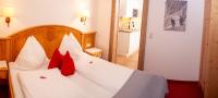 Postel nebo postele na pokoji v ubytování Appartement-Gästehaus Ursula