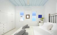 Łóżko lub łóżka w pokoju w obiekcie Paradisiacal Villa with Pool and Sea View in Mykonos