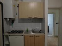 Kuchyňa alebo kuchynka v ubytovaní Gabbiano Apartments