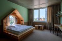 Posteľ alebo postele v izbe v ubytovaní Superbude Wien Prater