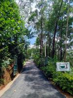 a road with a sign on the side of it at Soanala in Moramanga