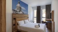 B&B HOTEL Como Baradelloにあるベッド
