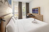 B&B HOTEL Como Baradelloにあるベッド