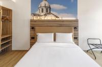 B&B HOTEL Como Baradelloにあるベッド