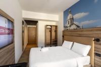 B&B HOTEL Como Baradelloにあるベッド