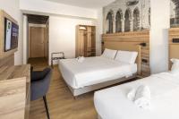 B&B HOTEL Como Baradelloにあるベッド