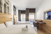 B&B HOTEL Como Baradelloにあるベッド