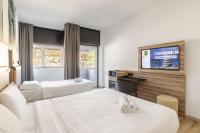 B&B HOTEL Como Baradelloにあるベッド