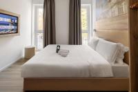 B&B HOTEL Como Baradelloにあるベッド