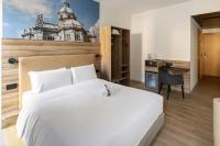 B&B HOTEL Como Baradelloにあるベッド