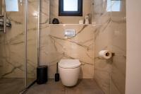 Ein Badezimmer in der Unterkunft Sun City - By Harim