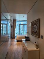 Ein Bett oder Betten in einem Zimmer der Unterkunft STUDIO ONE Stunning Marina View - TIE Hotels &amp; Resorts