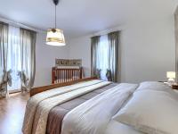 Posteľ alebo postele v izbe v ubytovaní Apartment Rustica by Interhome