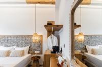 Posteľ alebo postele v izbe v ubytovaní Flèria Seaview Suites