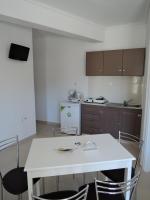 Kuchyň nebo kuchyňský kout v ubytování Fantasia Hotel Apartments