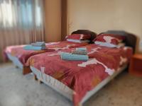 Postel nebo postele na pokoji v ubytování Elena Holiday Apartment