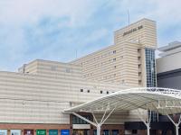 a large building with a sign that reads amazon at JR Kyushu Hotel Nagasaki in Nagasaki