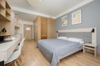 Postel nebo postele na pokoji v ubytování Business Studio Apartments Wolska by Noclegi Renters