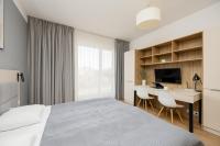 Postel nebo postele na pokoji v ubytování Business Studio Apartments Wolska by Noclegi Renters