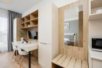 TV a/nebo společenská místnost v ubytování Business Studio Apartments Wolska by Noclegi Renters