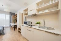 Kuchyň nebo kuchyňský kout v ubytování Business Studio Apartments Wolska by Noclegi Renters