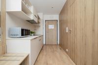 Kuchyň nebo kuchyňský kout v ubytování Business Studio Apartments Wolska by Noclegi Renters