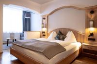 Posteľ alebo postele v izbe v ubytovaní Landhotel Zellerhof
