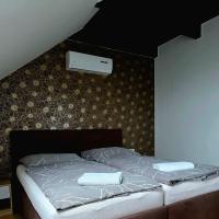 Postel nebo postele na pokoji v ubytování Apartmány pod Pálavou