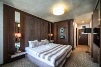 Postel nebo postele na pokoji v ubytování Grand Hotel Bansko - Fitness & SPA