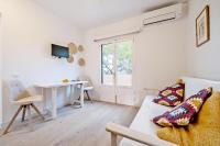 Televízia a/alebo spoločenská miestnosť v ubytovaní Apartamento Ses Botges - Formentera Break