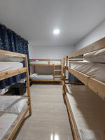 Postel nebo postele na pokoji v ubytování Albergue La Costana