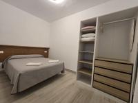 Posteľ alebo postele v izbe v ubytovaní Apartamentos Casa Sardina