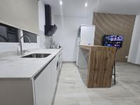 Kuchyňa alebo kuchynka v ubytovaní Apartamentos Casa Sardina