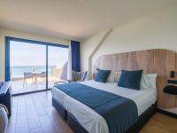 Postel nebo postele na pokoji v ubytování Sercotel Playa Canteras
