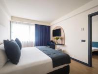 Postel nebo postele na pokoji v ubytování Sercotel Playa Canteras
