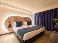 Postel nebo postele na pokoji v ubytování Sercotel Playa Canteras
