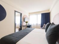 Postel nebo postele na pokoji v ubytování Sercotel Playa Canteras